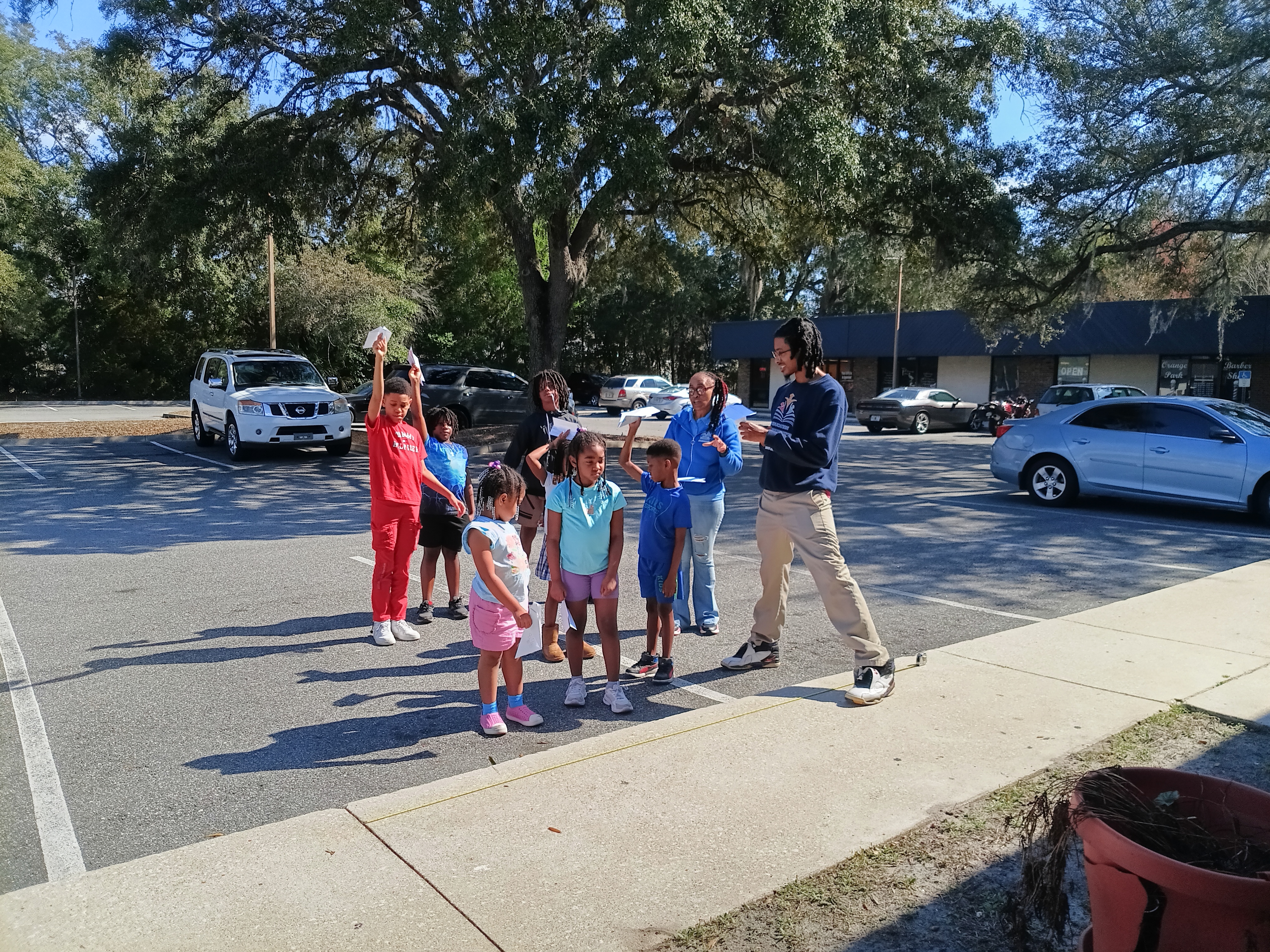 Students showing completed work from STEAM challenge